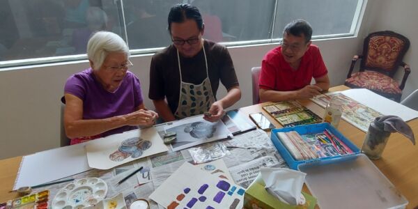 Seniors having art class with award-winning Malaysian artist, Yeoh Kean Thai